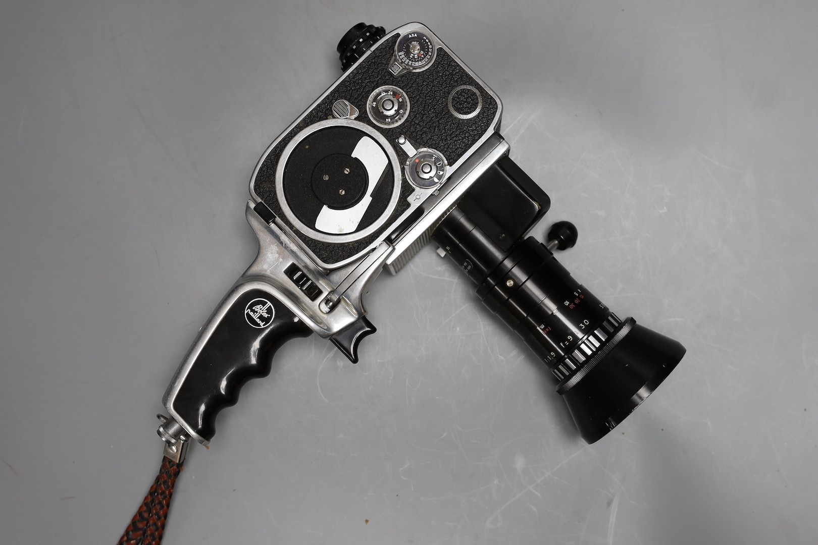 A vintage Bolex zoom reflex cine camera in original leather case